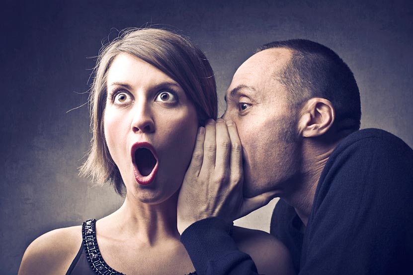 Man Whispering in Woman’s Ear Man Whispering in Woman's Ear